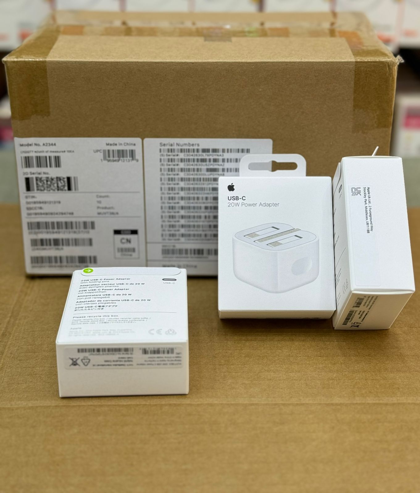 پک ده عددی شارژر ۲۰ وات اورجینال آیفون شرکت اپل بارکد دار بدون کابل مدل A 2344  اصل Apple ۲۰W 3pin Power Adapter